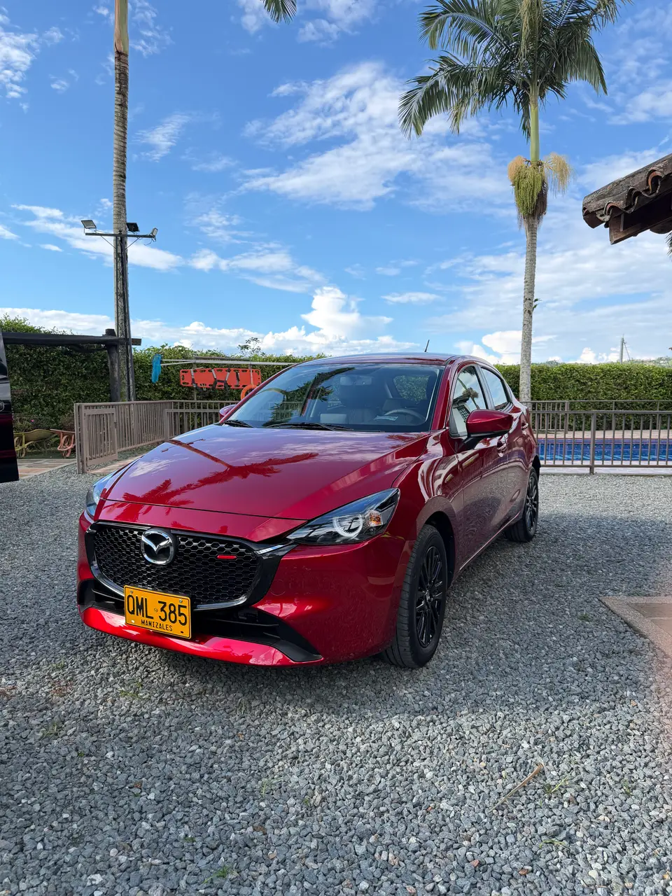 Mazda roja, premio de la rifa